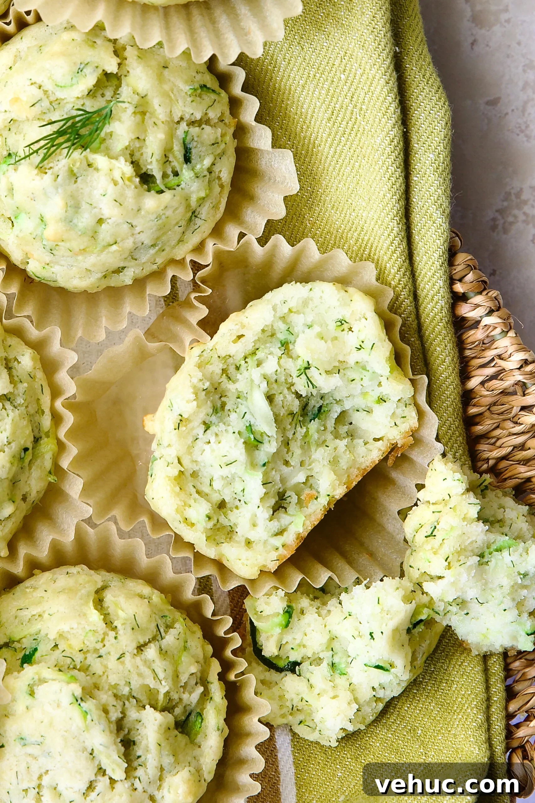 Zucchini Ricotta Dill Muffins: Savory Summer Snack 13 Close-up of Dill Zucchini and Ricotta Muffin broken into pieces.