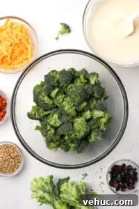 Crispy Broccoli Salad with Creamy Parmesan Dressing 16 A large bowl of broccoli florets.