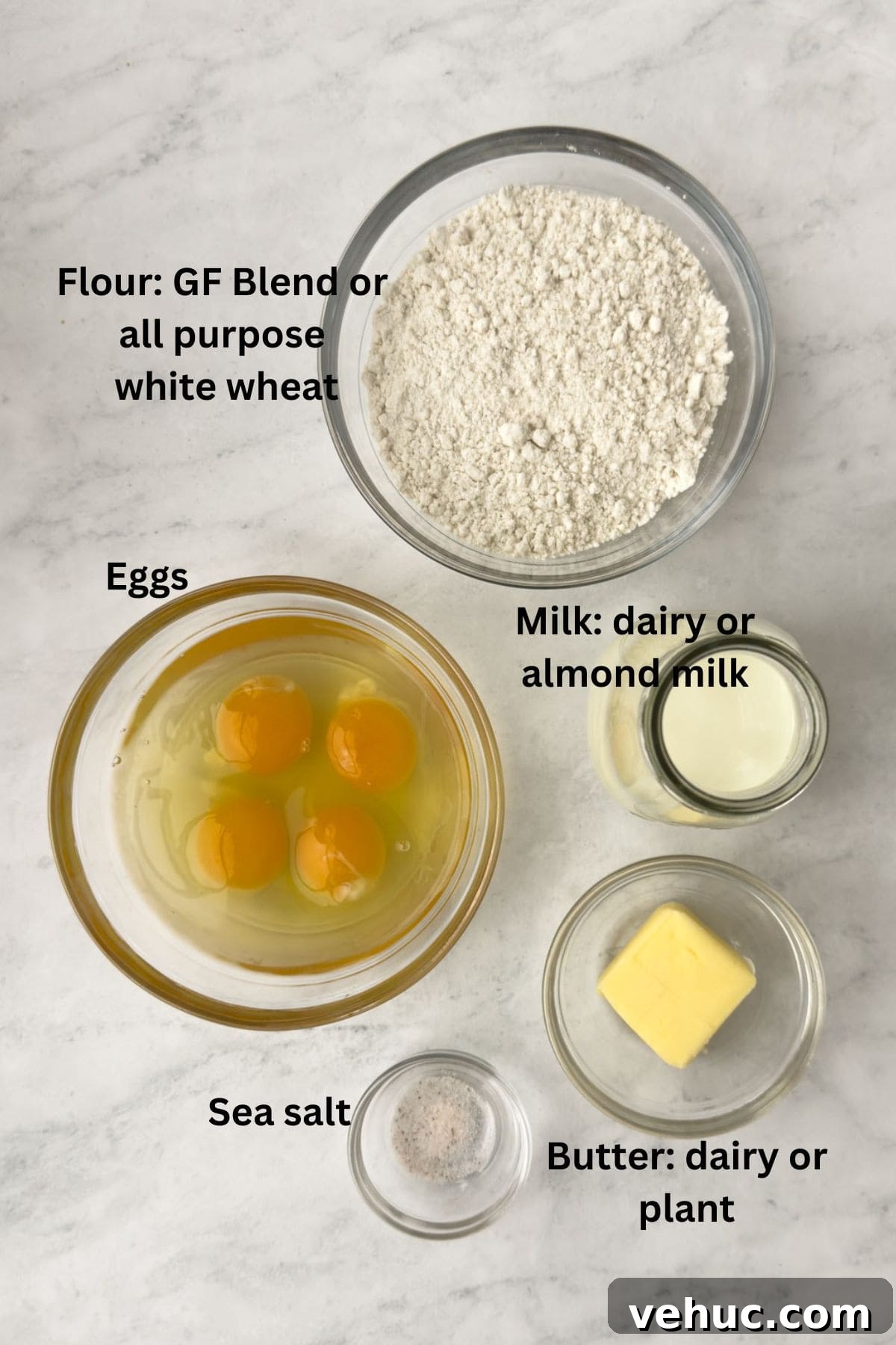 Gluten-Free Dutch Baby Pancake Recipe (German Pancake) 3 Simple ingredients for a Dutch baby pancake in bowls on the counter.