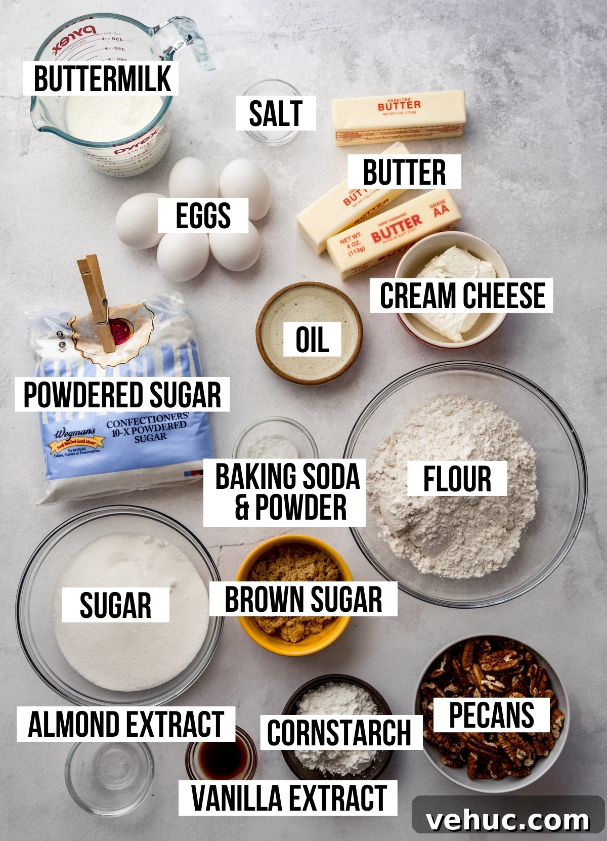 Decadent Butter Pecan Layer Cake Recipe 3 Aerial photo if the ingredients to make butter pecan cake with text overlay labeling each ingredient.