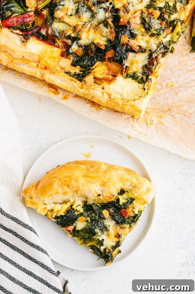 Vibrant Rainbow Swiss Chard Tart Recipe for Spring Entertaining 4 swiss chard tart slice on a white plate