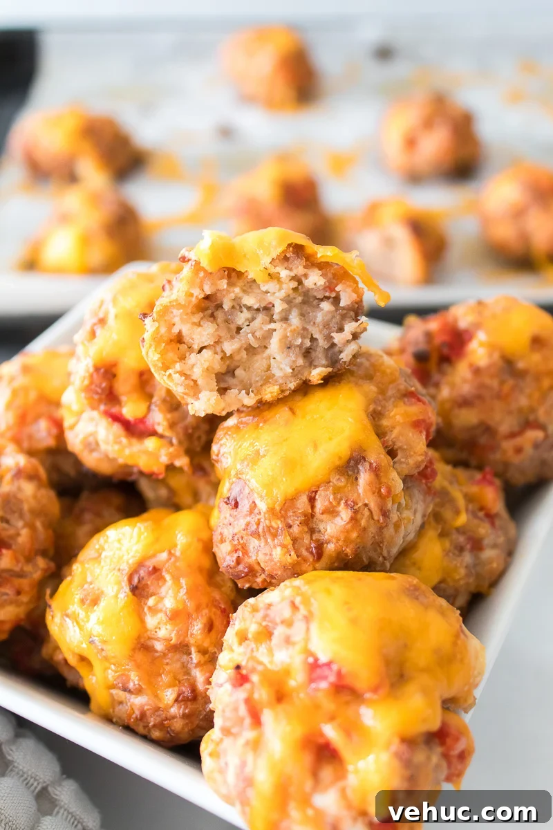 Christmas Brunch Finger Foods to Impress Guests 5 Sausage balls in white platter.