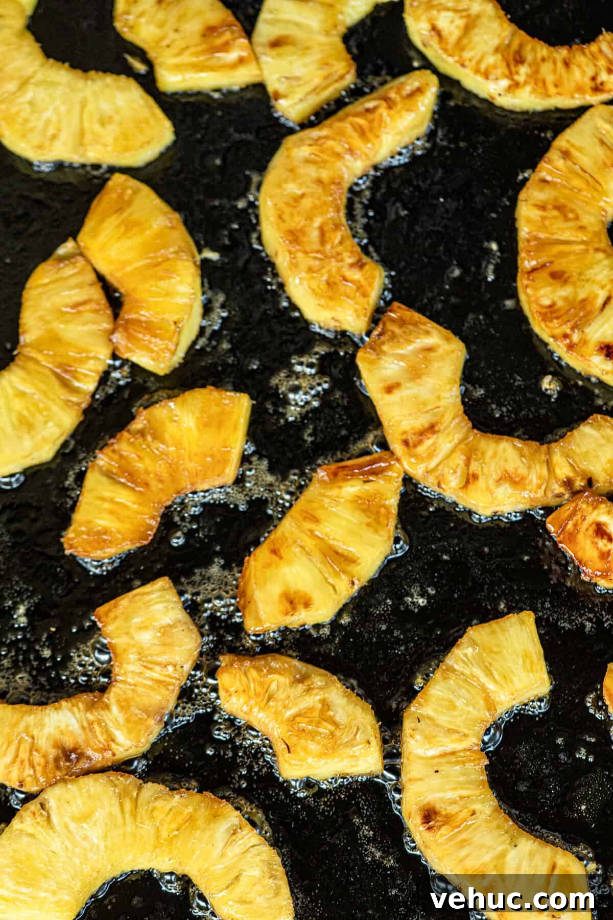 How to Grill Pineapple Perfectly: Sweet, Caramelized Slices Every Time 6 Grilled Pineapple on grill with a caramelized golden brown