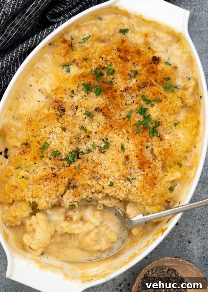 Creamy Chicken and Zucchini Casserole for Weeknight Dinner 7 Top crunchy crust on top of cauliflower florets baked in a creamy, cheesy sauce.