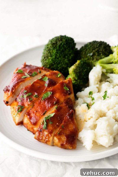 Crispy Air Fryer BBQ Chicken Recipe for Tender, Smoky Flavor 2 sliced air fryer bbq chicken
