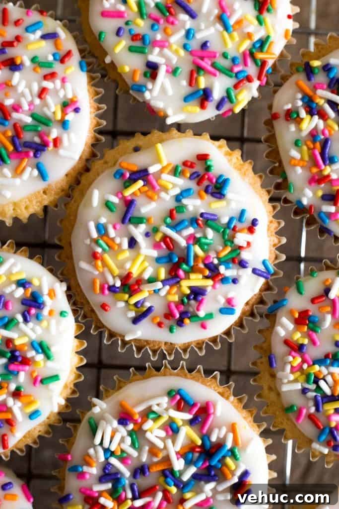 Gluten-Free Fairy Cakes Recipe: Light, Fluffy Mini Cupcakes 3 fairy cakes on a cooling rack