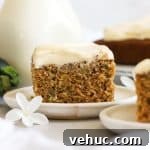 slices of gluten-free zucchini cake on white dessert plate
