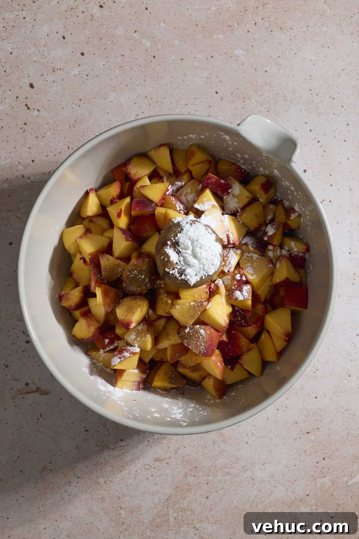 Sourdough Peach Cobbler Recipe: Rustic Peach Cobbler with Tangy Crust 5 Filling ingredients in a large mixing bowl.