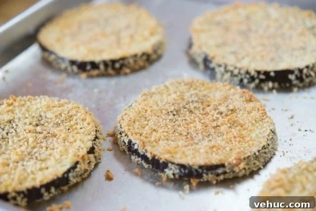 Baked Eggplant Parmesan Lasagna Recipe baked Breaded Eggplant Slices on Sheet Pan