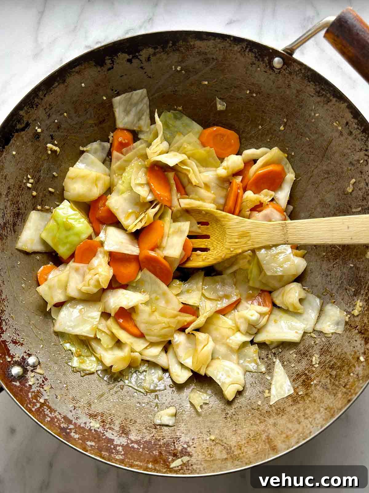 sauce being thickened in stir-fry.