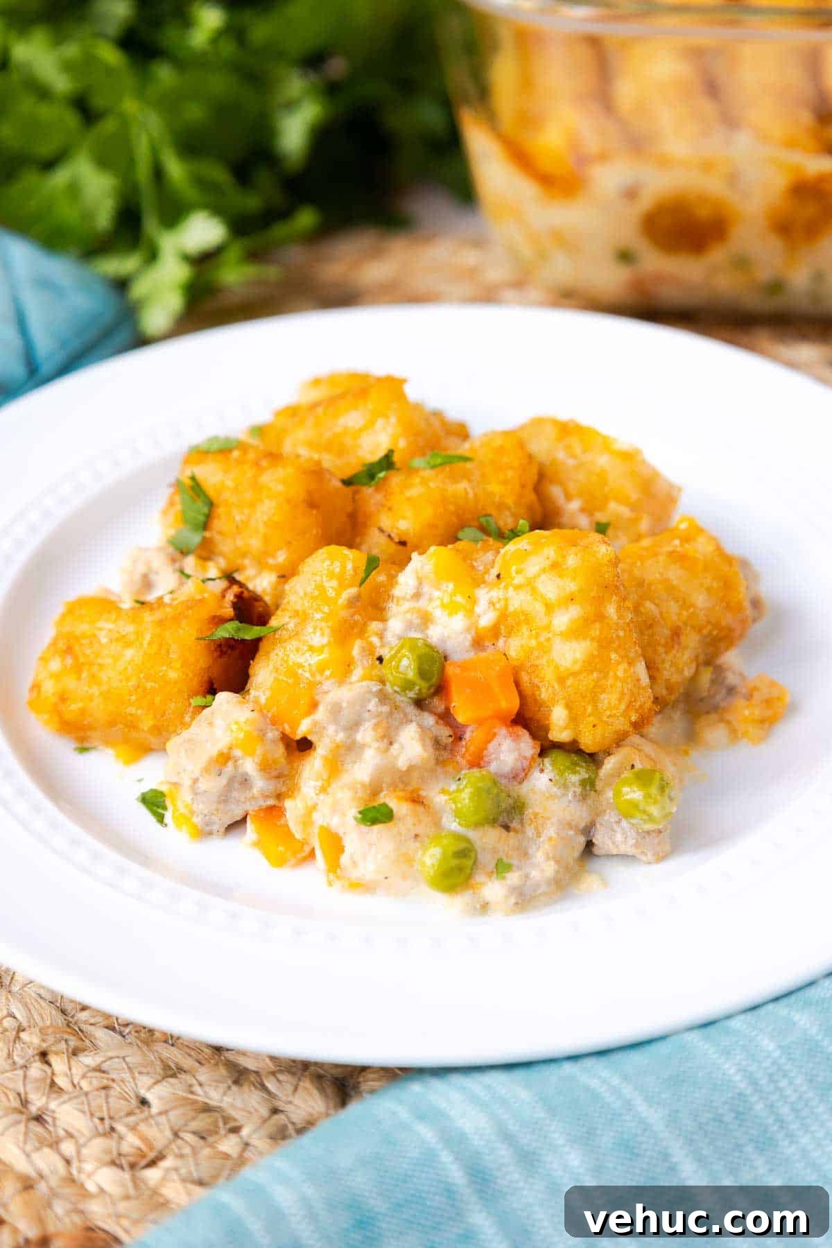 Cheesy Ground Turkey Tater Tot Casserole Recipe 2 Tater Tot Casserole with ground turkey, peas, and carrots in a creamy sauce.