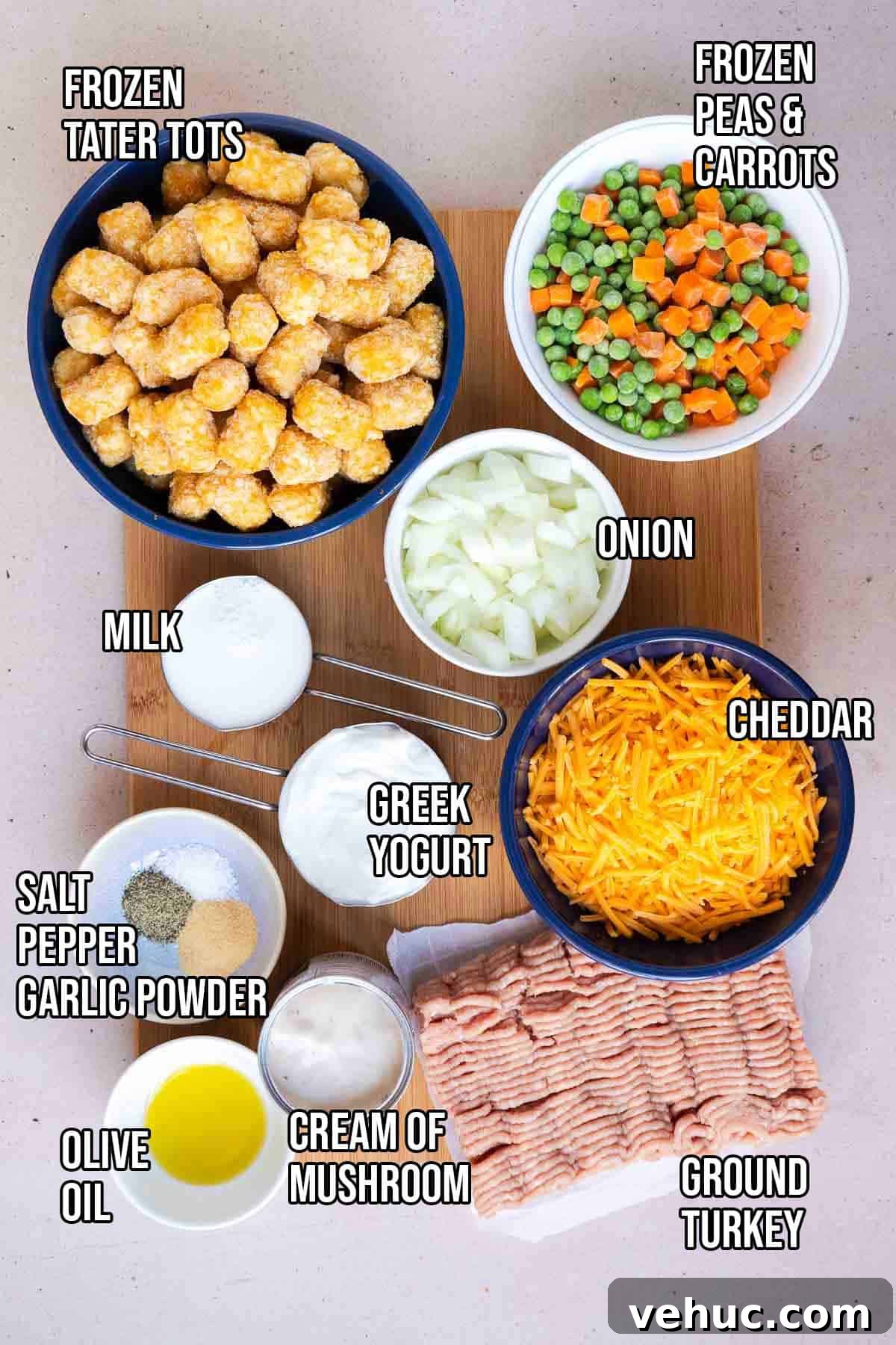 Cheesy Ground Turkey Tater Tot Casserole Recipe 3 Turkey tater tot casserole ingredients: olive oil, ground turkey, yellow onion, cream of mushroom soup, Greek yogurt, shredded cheddar, milk, frozen peas and carrots, salt, pepper, garlic powder, and frozen tater tots.