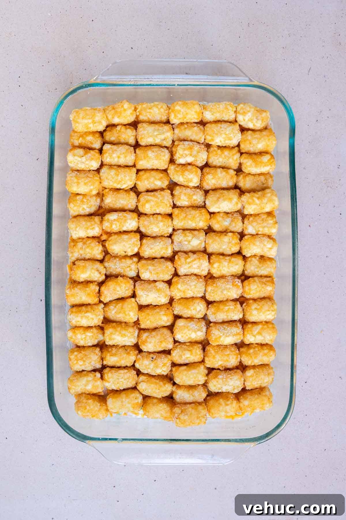 Cheesy Ground Turkey Tater Tot Casserole Recipe 8 Tater tots are placed on their side in a single layer to cover as much room as possible.
