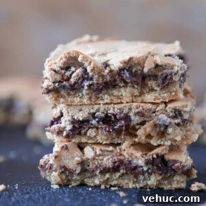 Chocolate Halfway Bars: Layered Chocolate Peanut Butter Snack Bars 8 Chocolate Halfway Bars stacked melted chocolate.