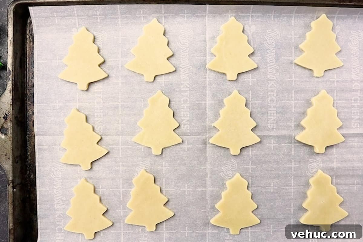 Christmas Tree Cookie Recipes: Festive Holiday Treat Ideas 9 cookies on baking sheet before baking