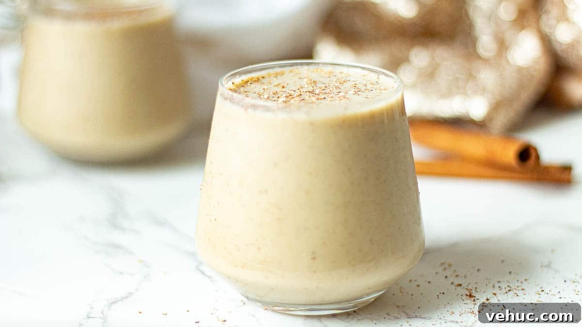 Creamy Oat Milk Eggnog Recipe for Holiday Parties 3 vegan oat nog recipe in glasses