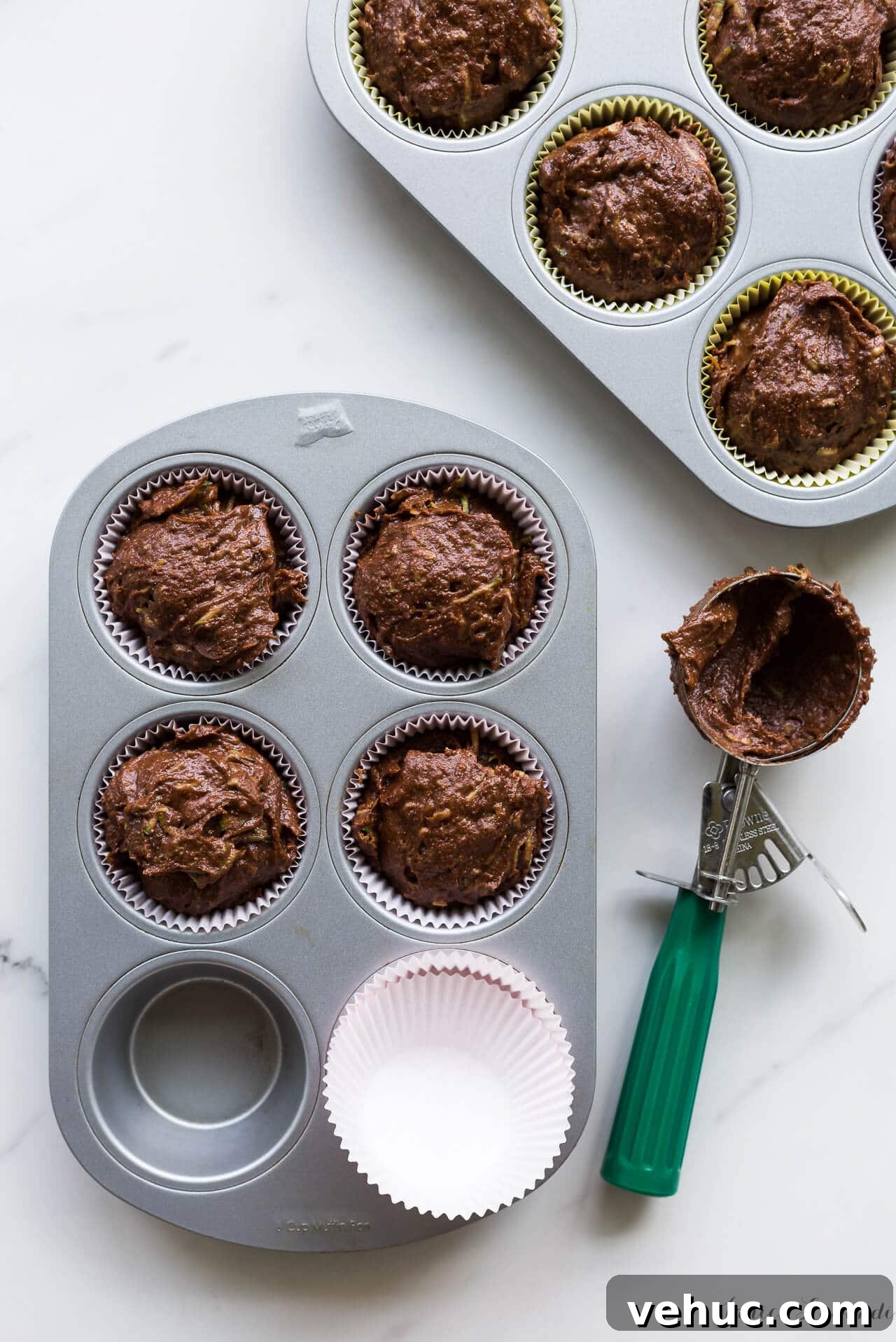 Essential Baking Tools: Complete Guide to Must-Have Equipment 3 Zucchini chocolate muffins scooped