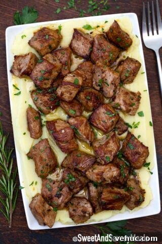 garlic butter steak bites with mashed potatoes