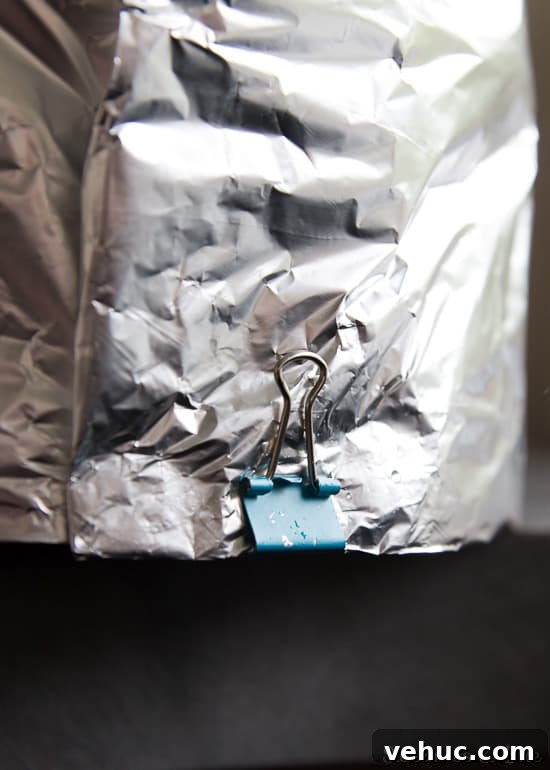 DIY Cake Strips: How to Wrap, Use, and Bake Even Layers 12 Another binder clip attached to the bottom edge of the cake strip.