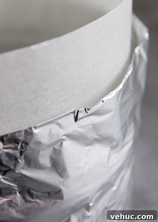 DIY Cake Strips: How to Wrap, Use, and Bake Even Layers 14 A close up of a snip in the top edge of the cake strip, to let the steam out.