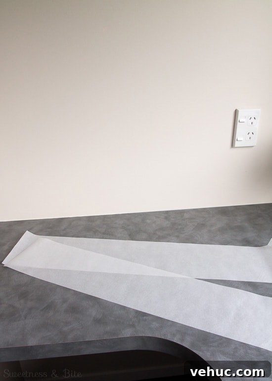 DIY Cake Strips: How to Wrap, Use, and Bake Even Layers 5 The two long strips of baking paper.