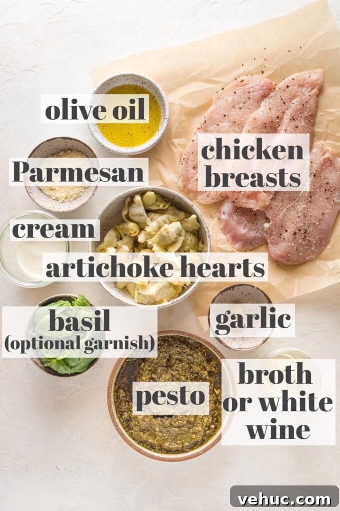 Pesto Chicken with Roasted Artichokes Recipe 3 Labeled photo of prep bowls and parchment holding chicken breasts, olive oil, Parmesan, cream, artichoke hearts, fresh basil, pesto, garlic, and white wine, which can be substituted with chicken broth.