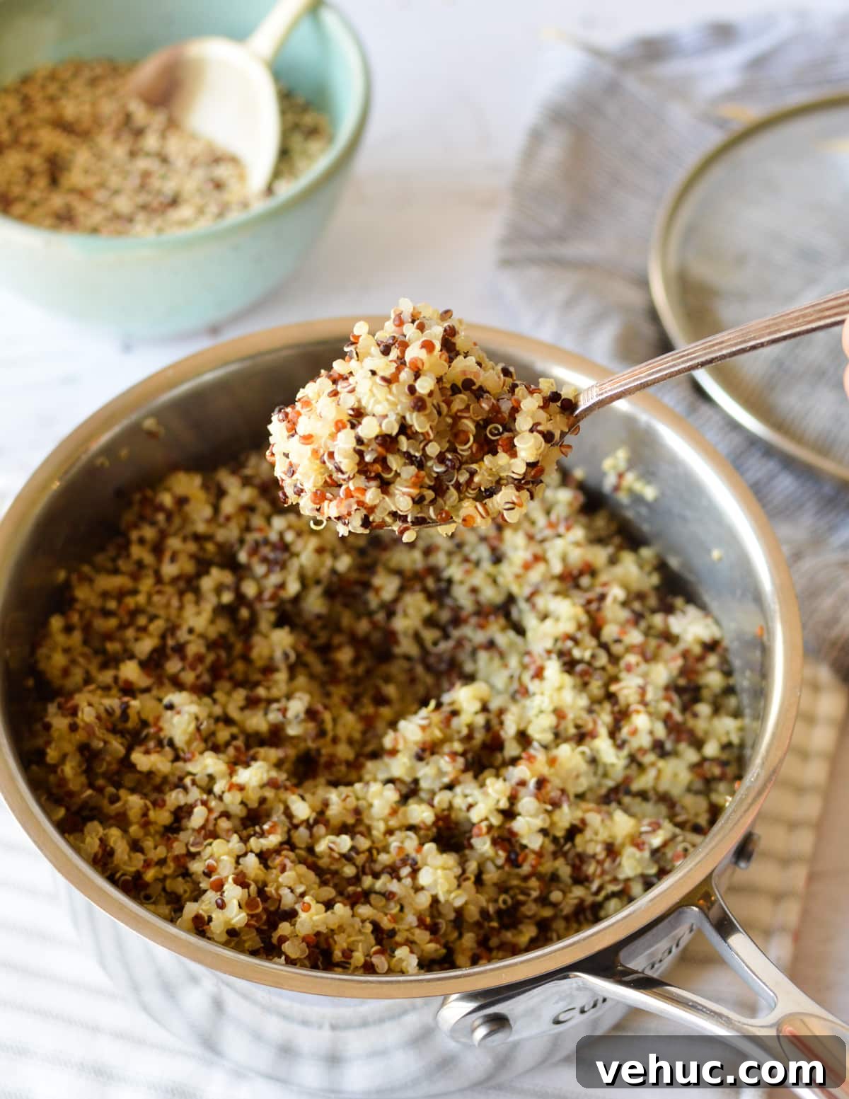 How to Cook Tri-Color Quinoa Perfectly Every Time 8 a spoonful of cooked tri color quinoa
