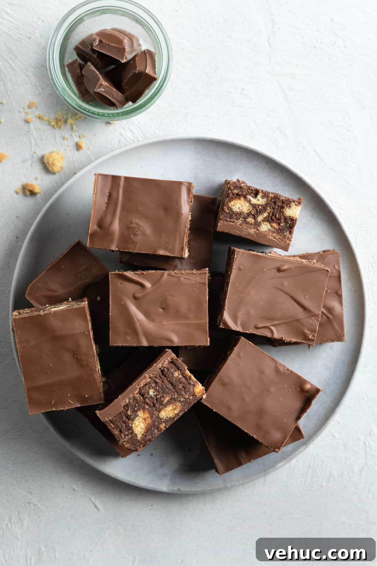 No-Bake Chocolate Hedgehog Slice Recipe: Quick Crowd-Pleaser 7 Cut pieces of slice on a round plate.