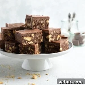 Cut pieces of slice, sitting on a round white cake stand.