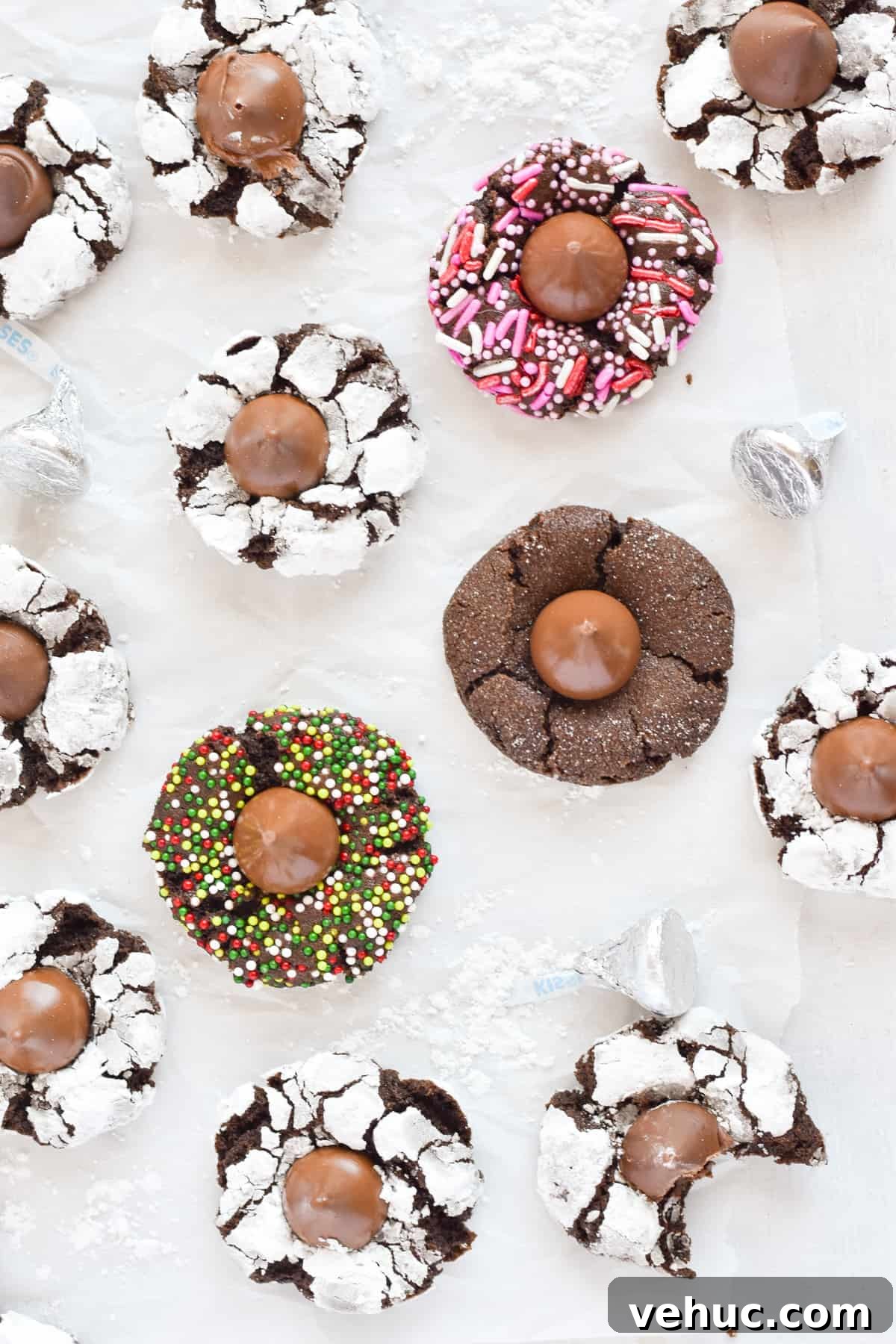 Cocoa Blossom Cookies Recipe: Soft Chocolate Flower Cookies 9 cocoa blossom cookies rolled in different things: powder sugar, christmas sprinkles, pink and whtie valentines sprinkles, and granulated sugar.