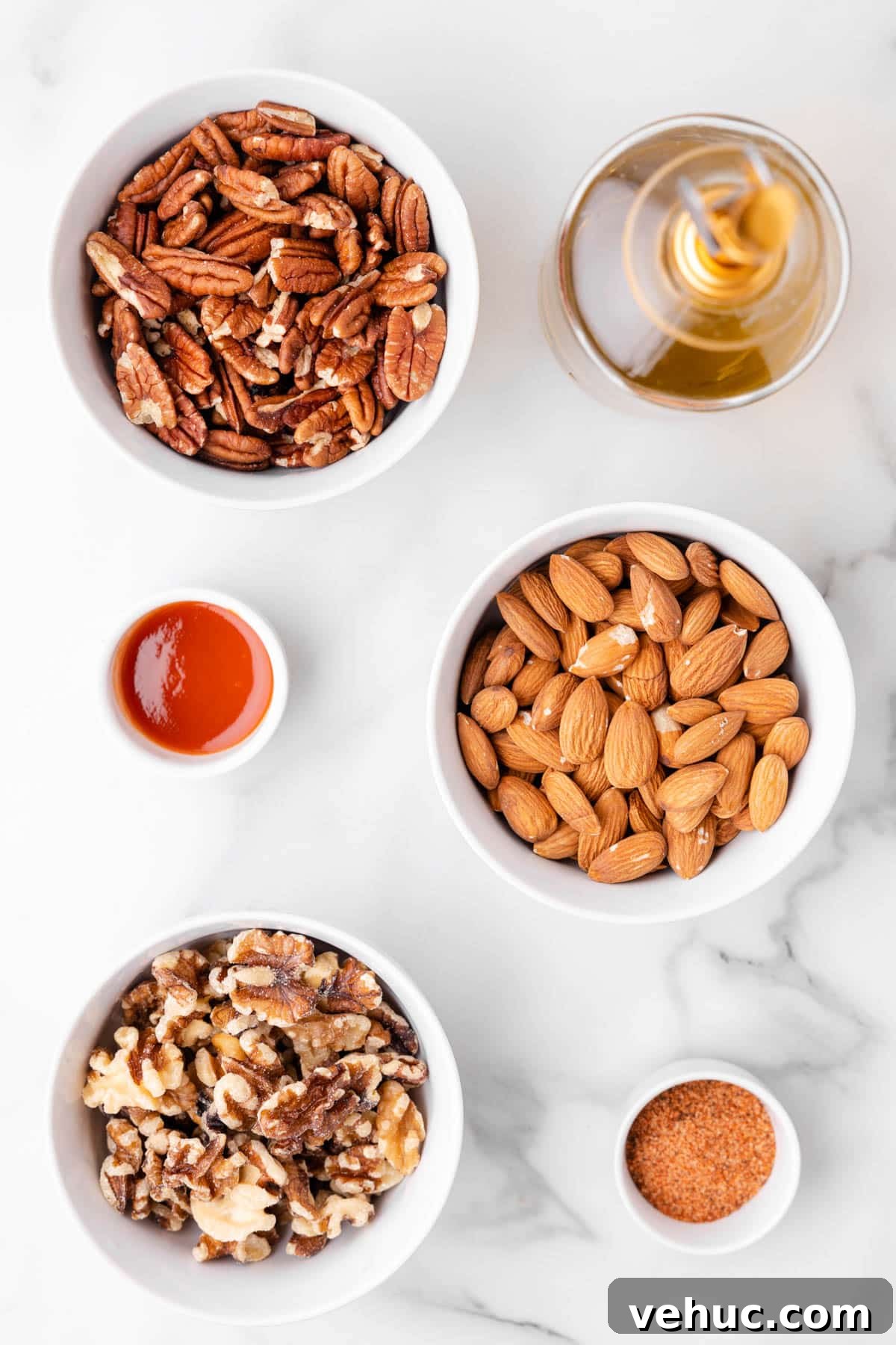 Cajun-Spiced Mixed Nuts: Bold and Flavorful Snack Recipe 3 overhead photo of bowls of ingredients needed to make cajun spicy mixed nuts