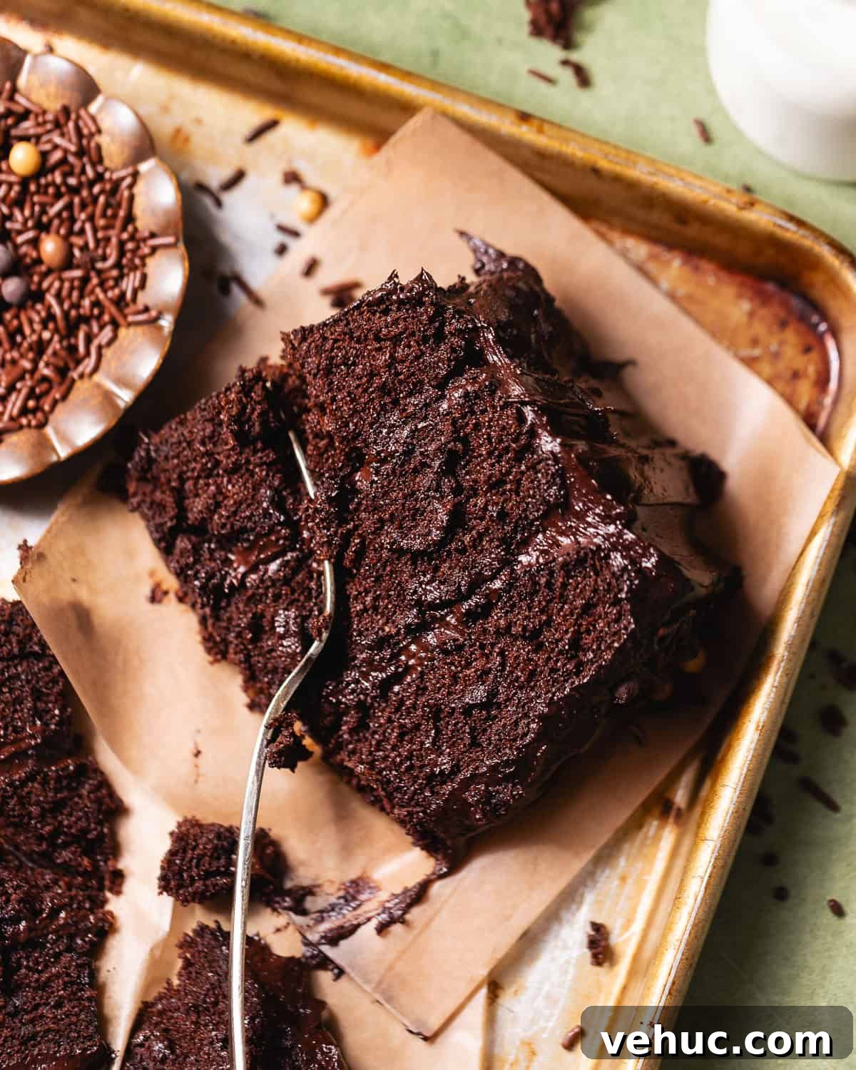 Moist Chocolate Cake Recipe That Tops Bakery Cakes 10 Close-up of a slice of moist chocolate cake with soft crumb and chocolate frosting.