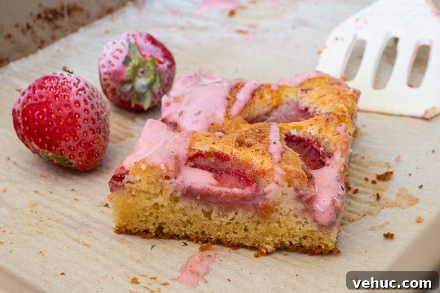 a slice of strawberry snacking cake