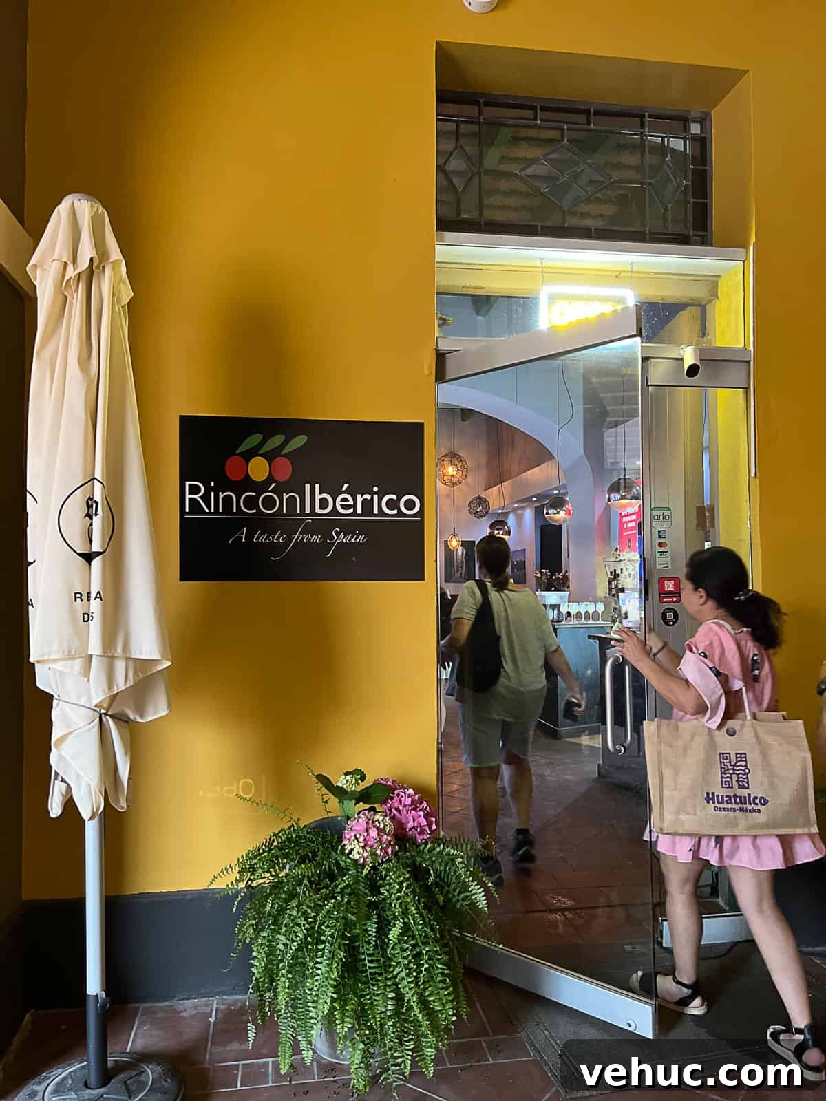 Rincón Ibérico: Top Tapas & Wine Spot in San Juan 3 Entering Rincon Iberico San Juan Restaurant at night
