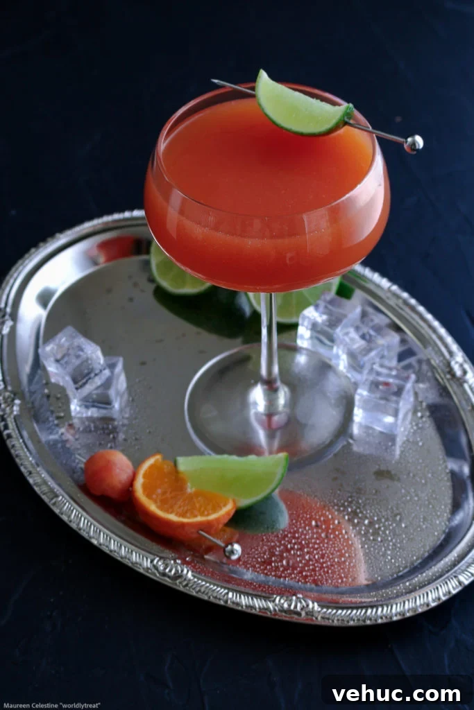 Papaya Mandarin Rum Cocktail Recipe — Tropical Citrus Drink 2 Papaya Mandarin Rum Cocktail-