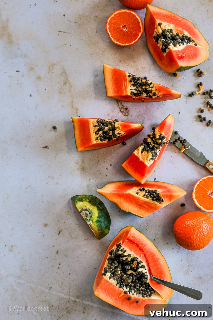 Papaya Mandarin Rum Cocktail Recipe — Tropical Citrus Drink 3 papaya