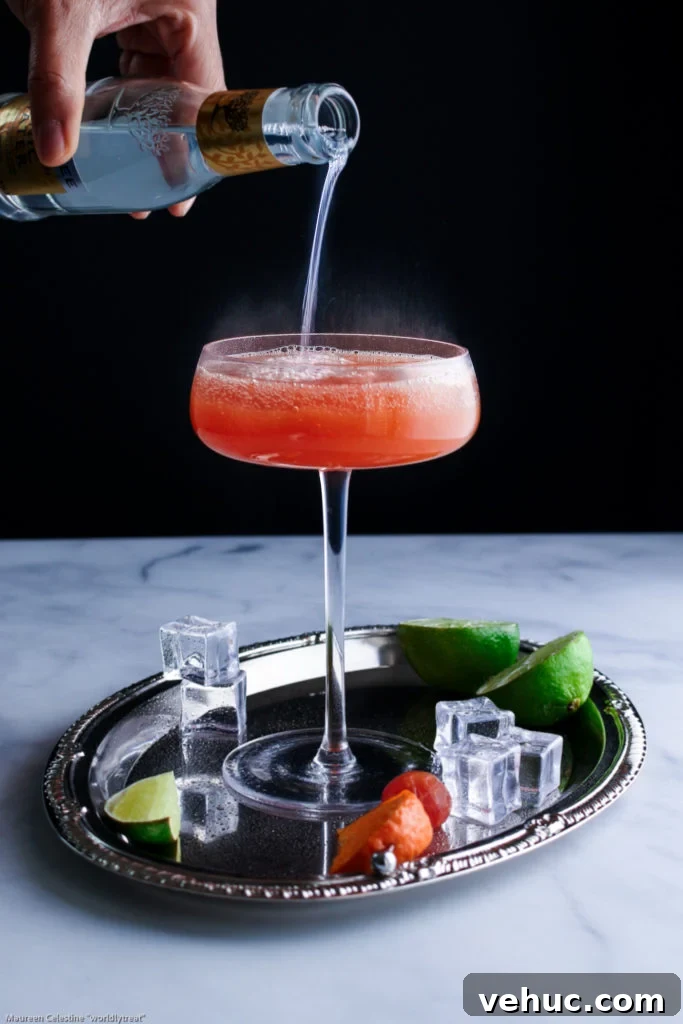 Papaya Mandarin Rum Cocktail Recipe — Tropical Citrus Drink 6 Papaya Mandarin Rum Cocktail
