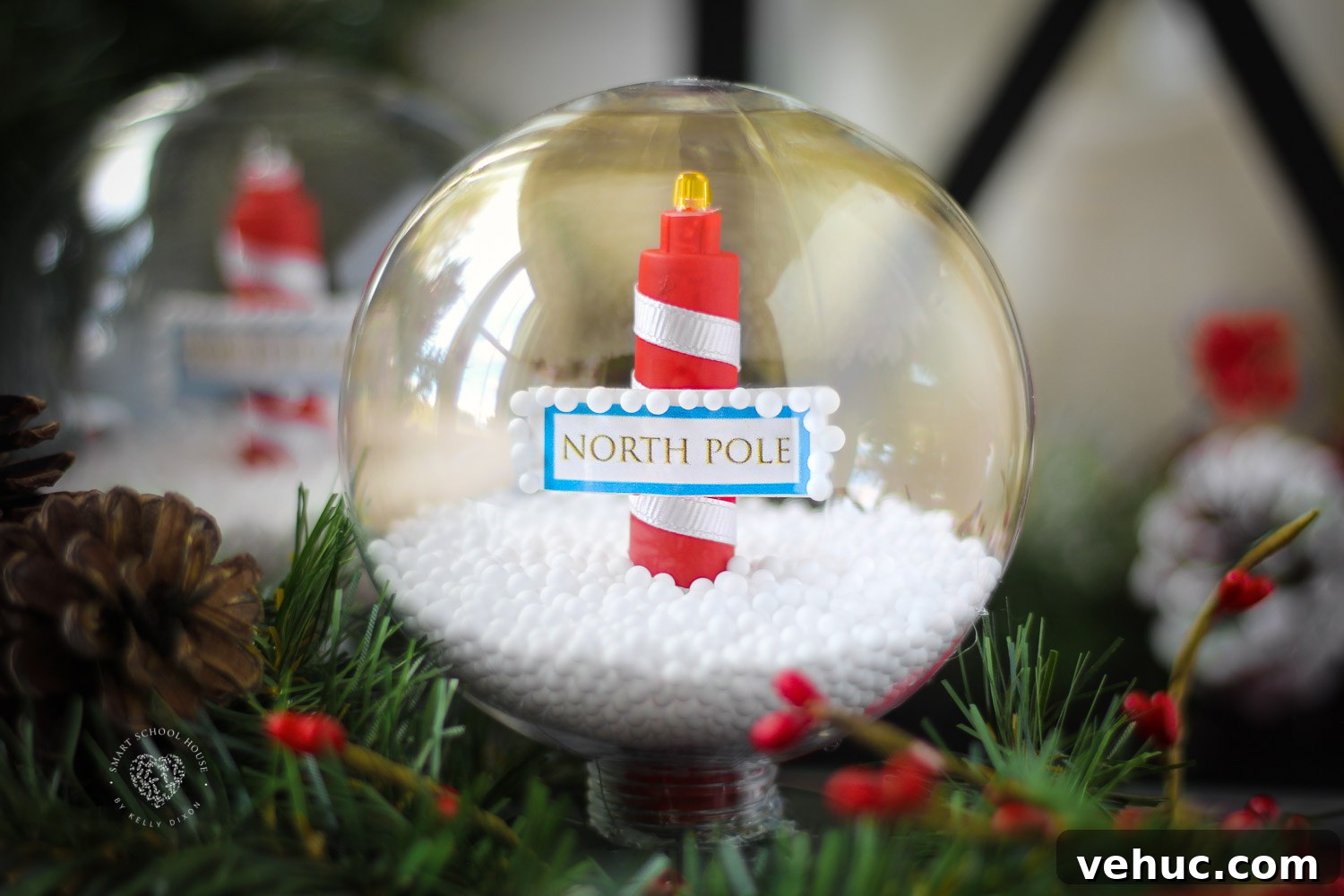 DIY Glowing Solar North Pole Snow Globe Made With a Plastic Ornament for Christmas