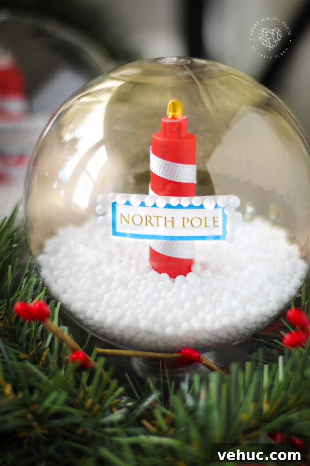 DIY Glowing Solar North Pole Snow Globe Made With a Plastic Ornament for Christmas