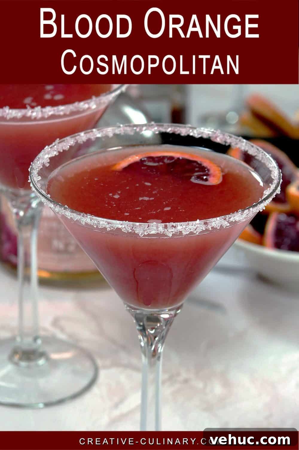 Blood Orange Cosmopolitan Cocktail Recipe — Bright Citrus Martini 6 Pin for A single Blood Orange Cosmopolitan cocktail with a sugar rim and slice of blood orange garnish.