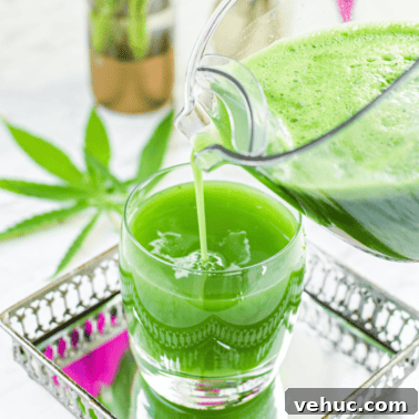 Beet Hummus Infused with Cannabis: A Flavorful Guide 9 A picture of green cannabis juice being poured into a glass.