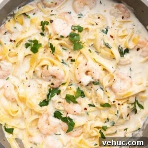 Creamy Garlic Prawn Linguine Recipe for Quick Weeknight Dinners 13 prawn linguine in a pan.