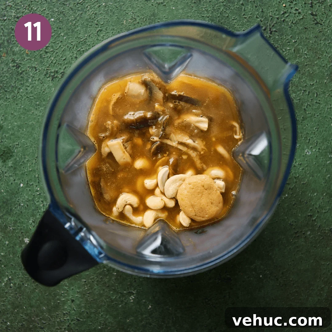 Velvety Vegan Mushroom Soup Recipe for Cozy Weeknights 14 mushroom soup in a stand blender with cashews and miso.
