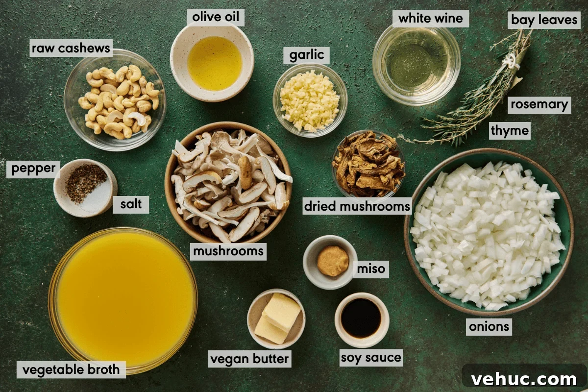 Velvety Vegan Mushroom Soup Recipe for Cozy Weeknights 4 ingredients for vegan mushroom soup in bowls laid out on a green table with ingredients labeled.