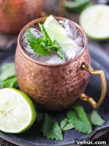 Virgin Moscow mule Mocktail in a copper mug on a silver tray.