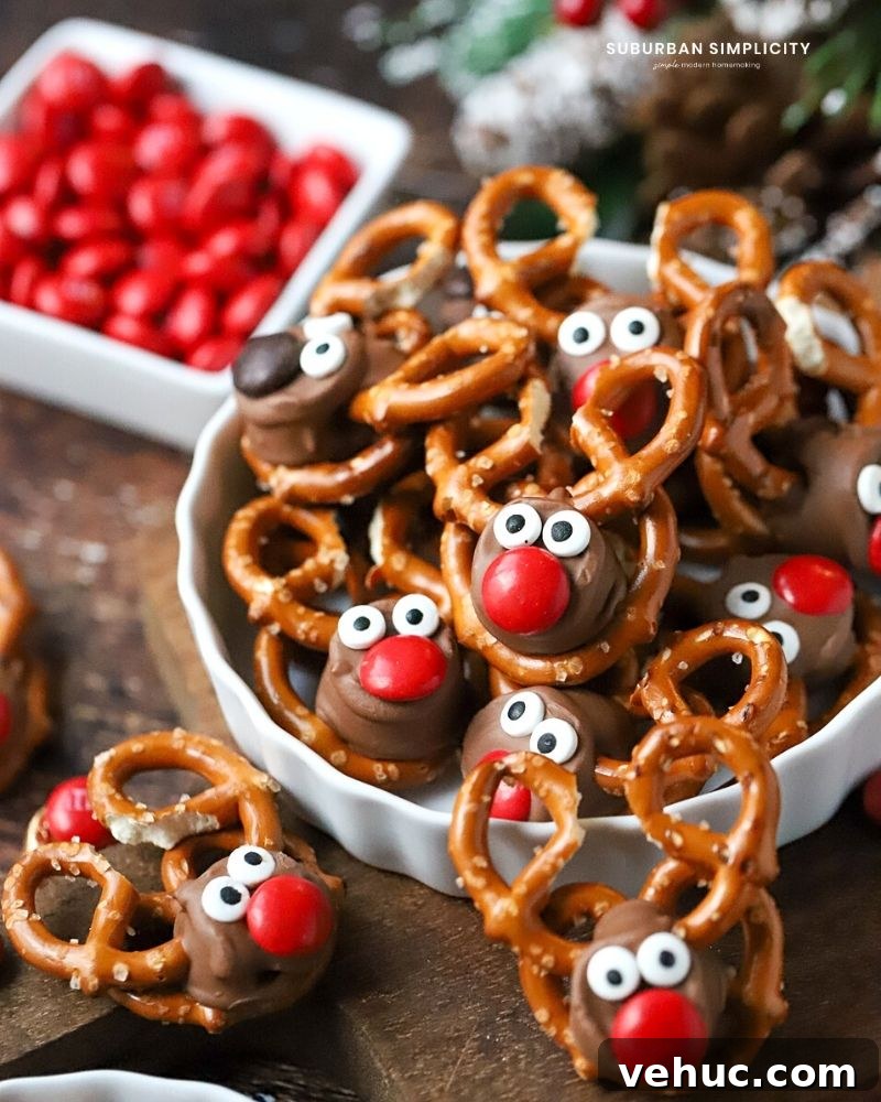27 Festive Christmas Finger Food Appetizers for Holiday Parties 21 Pretzel Rolo Reindeer in a dish