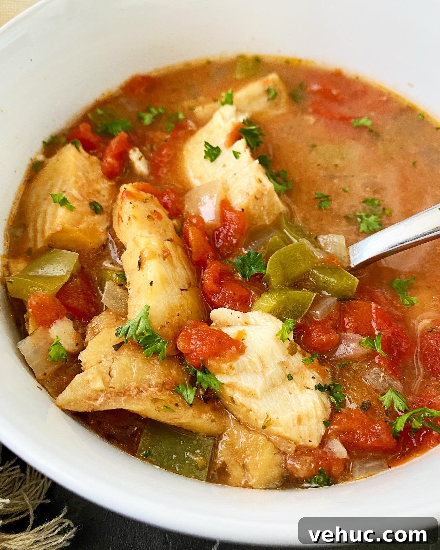 Mediterranean Slow-Cooker Fish Stew with Video Tutorial 7 overhead shot of Slow Cooker Mediterranean Fish Stew in a white bowl