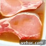 How to Brine Pork Chops for Juicy, Flavorful Results 7 soaking pork chops in the apple cider brine