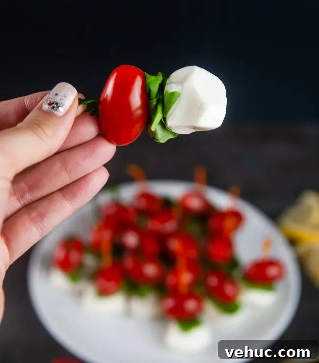 71 Festive Christmas Party Appetizers Your Guests Will Love 4 mini caprese skewers