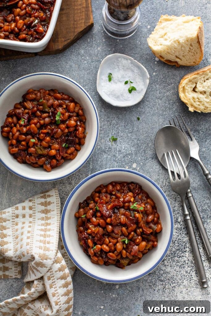Classic Homemade Baked Beans Recipe for Flavorful Comfort Food 7 Bowls filled with the best baked beans.